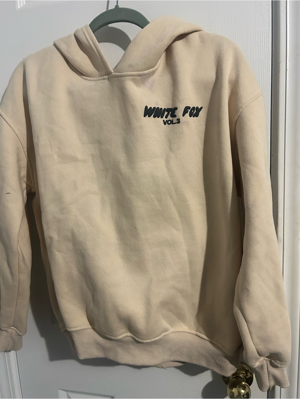 White Fox Boutique Offstage Hoodie Vol. 3 – Pebble with logo on front and back.